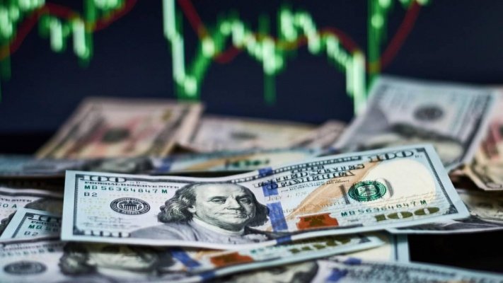 Dólar devolve ganhos e fecha abaixo de R$ 5,70 com promessas de contenção de gastos